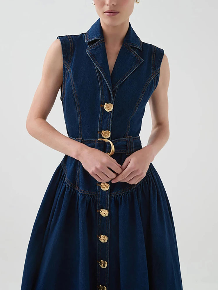 Seasonless navy midi dress with button front ideal for transitional layering and meetings