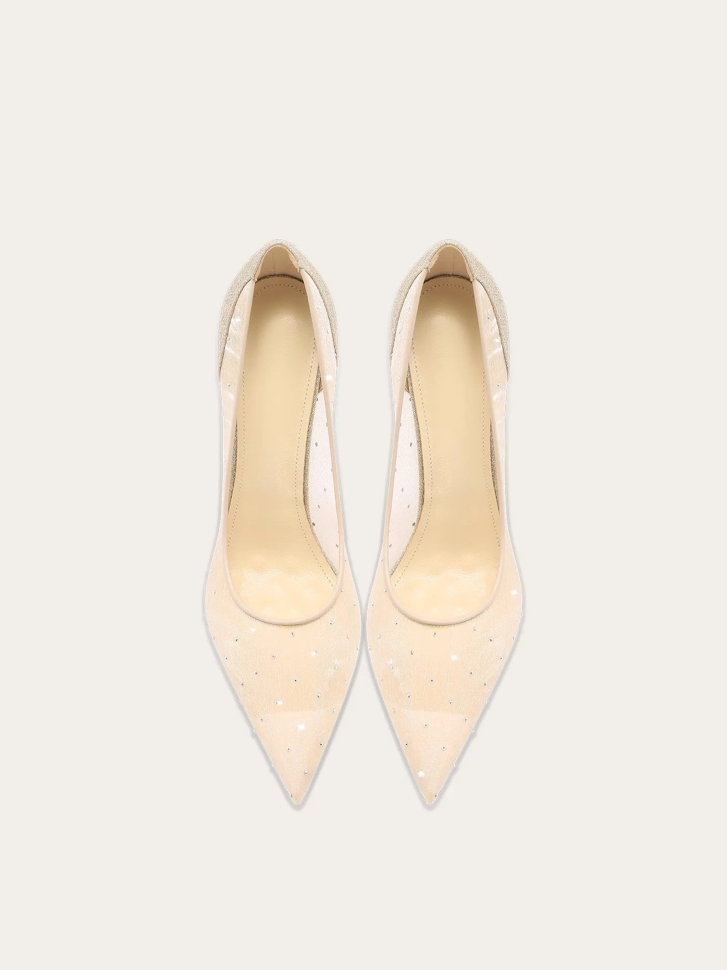 a sequin pump with a pointed toe and a thin heel.