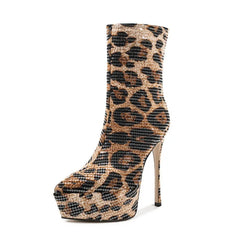 Pointed platform boots with sequin printed upper