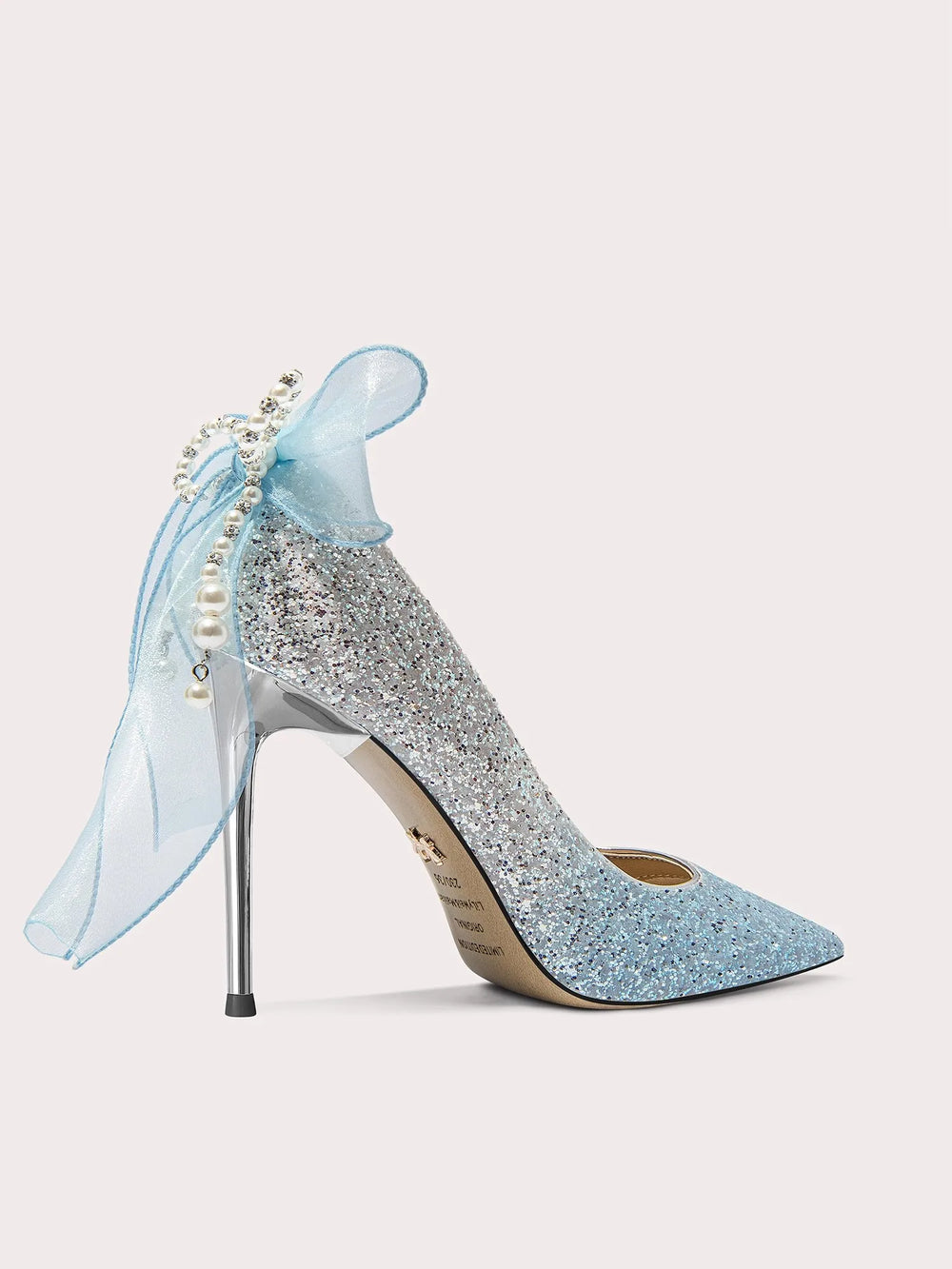Pointed toe bridal pumps with rhinestone detail