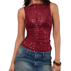 A woman wearing a sparkling sequined tank top.