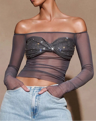 Sheer rhinestone mesh top styled for night out and layering