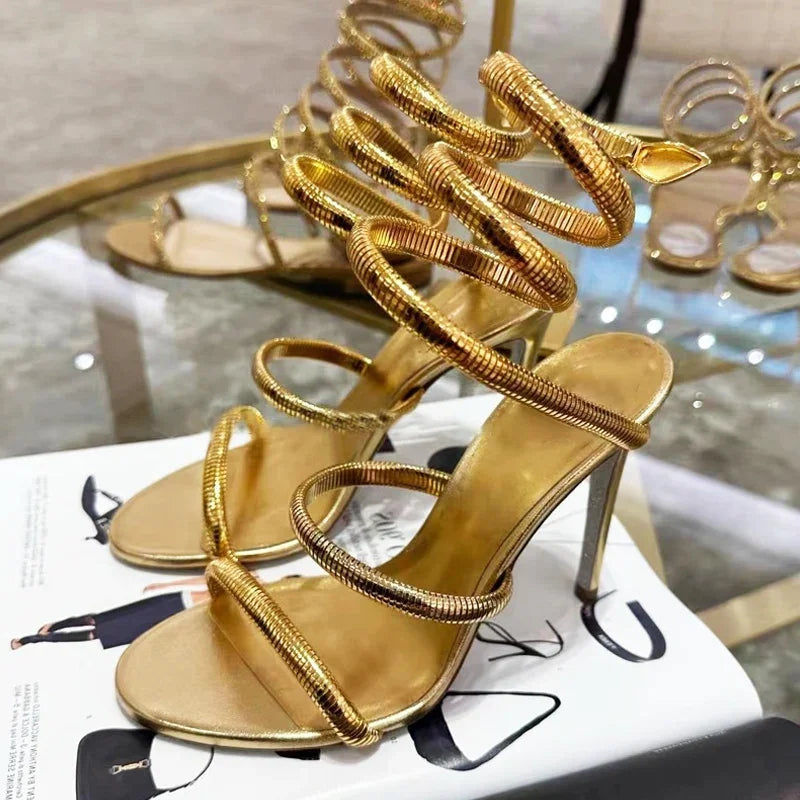 Shiny gold ankle wrap event shoes perfect for bold party looks