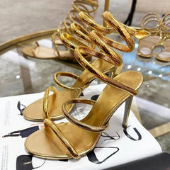 Shiny gold ankle wrap event shoes perfect for bold party looks