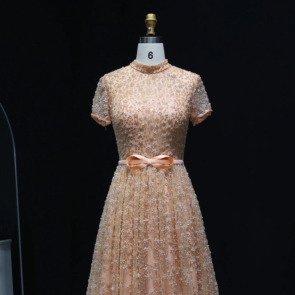 A-line tulle evening gown with natural waist and sweep train