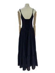 “Side profile of sleeveless patchwork mesh dress with spaghetti straps”