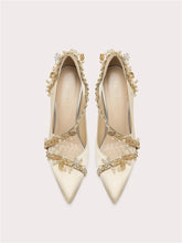 Silk wedding pumps with pearl strap and pointed toe