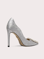 Close-up of silk print pumps with square crystal buckle