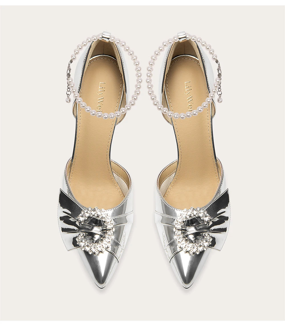 Silver pearl bow formal sandals styled for weddings and celebrations
