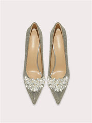 Silver sequin pointed-toe pumps with crystal beading detail at the front