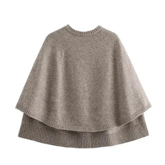 The back view of the sweater, showing the unique cape design.