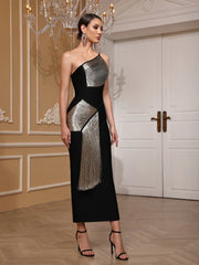 A woman wearing a slanted collar bodycon tassel dress with sculpted slim fit for spotted style in an elegant room.