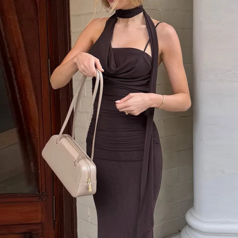 Slash neck brown halter dress shown for elegant party occasions