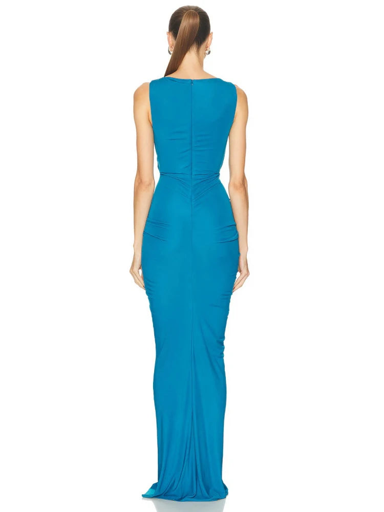 Sleek O-neck cutout gown shown as a statement formalwear option
