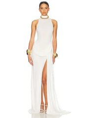 Sleek white evening dress with thigh-high slit and modern cut