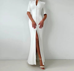 Sleek white party dress with slit for modern cocktail looks