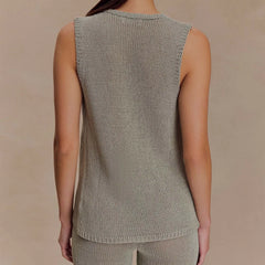Sleeveless gray knit top shown as a closet staple for chic outfits