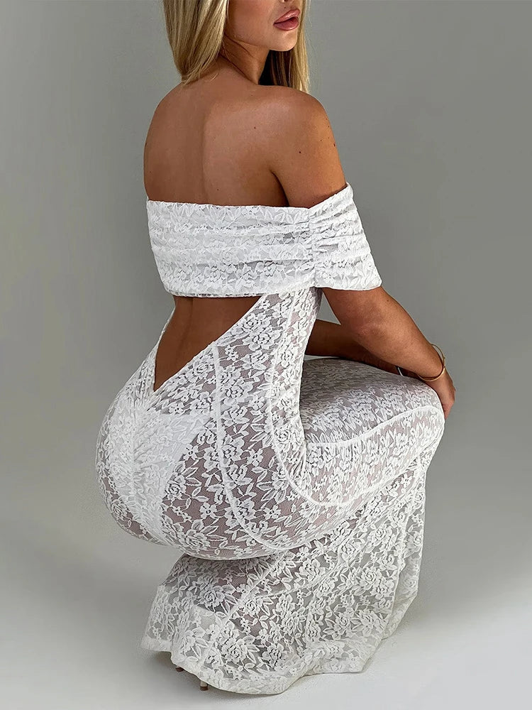 White lace off-shoulder dress on a plain background