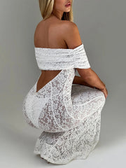 White lace off-shoulder dress on a plain background