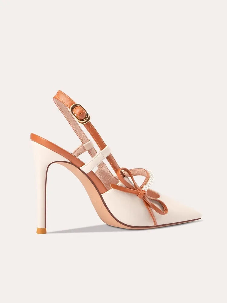 The slender thin-heel sandals with a buckle strap.
