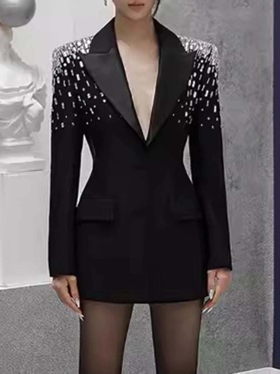 Front view of a blazer with a notched lapel and clean tailoring, emphasizing its sharp silhouette.