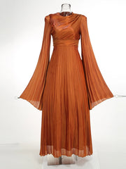 The slim fit of the dress, highlighting its flattering silhouette.