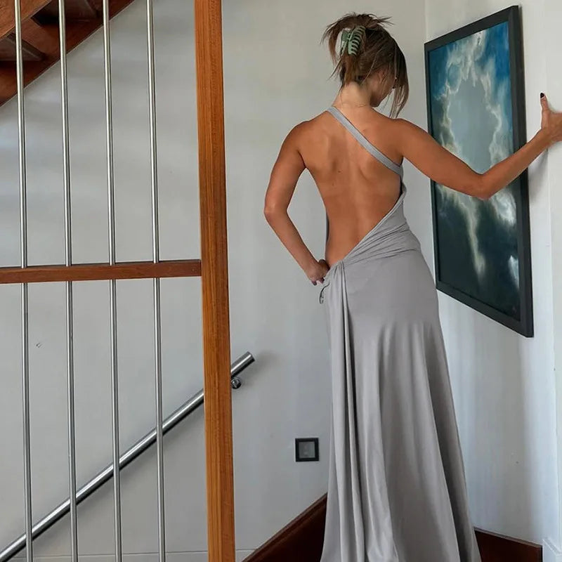The dress showing the slim fit and backless detail.