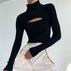 Close view highlighting the front cut-out and ribbed knit texture across the chest and neckline.