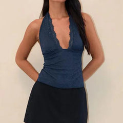 A close-up shot of the slim-fit tank, showing the delicate lace detail at the neckline.