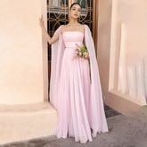 Soft pink A-line evening gown with square neckline and cape overlay