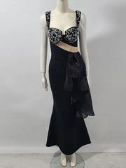 Spaghetti strap black gala dress styled for upscale formal events