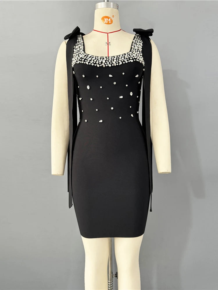 Spaghetti strap diamond bodycon gown with sleeveless cut