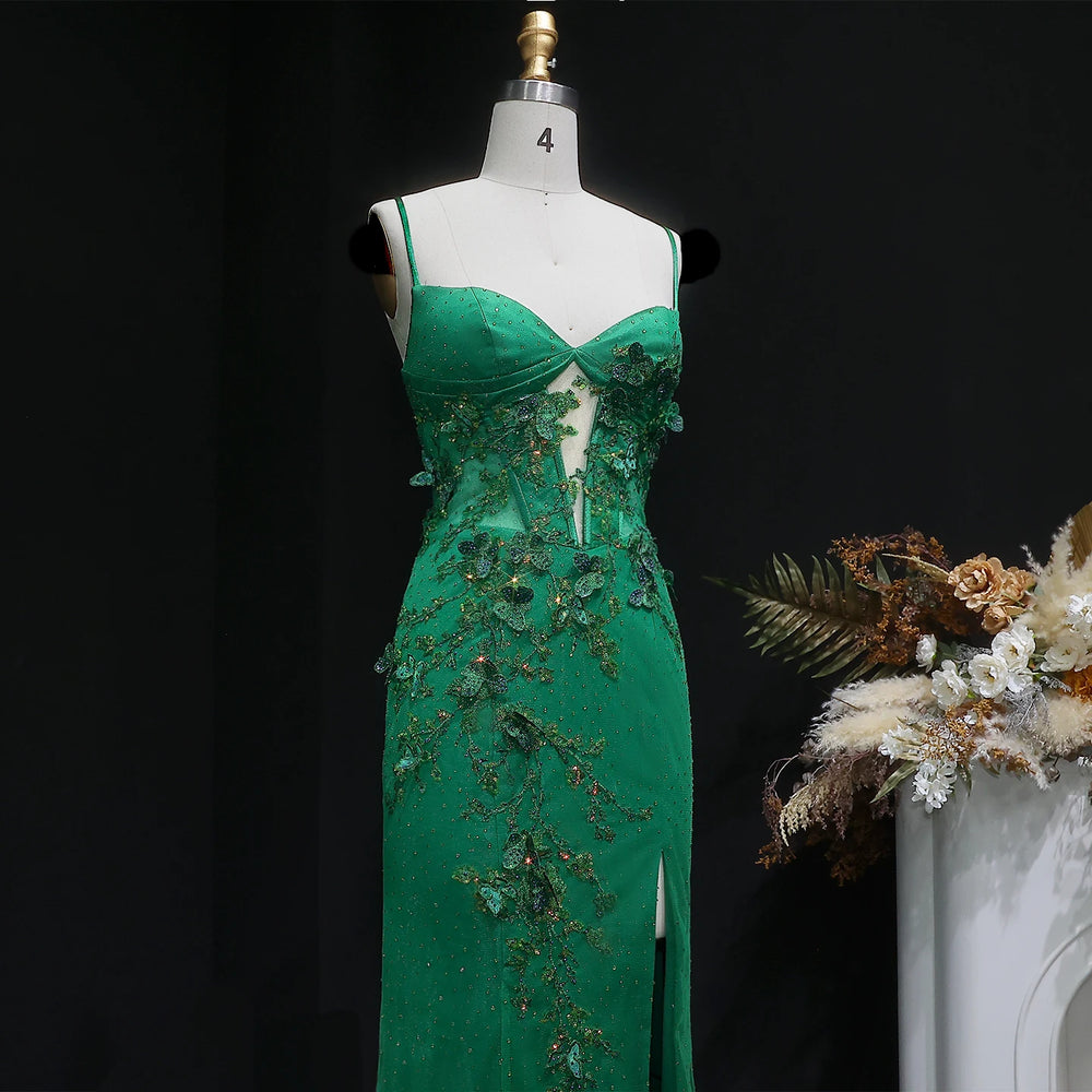 Backless formal gown with appliqué detailing and fitted waist