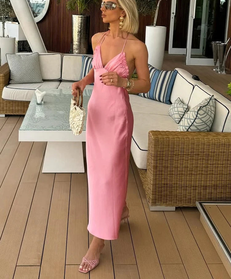 Spaghetti strap pink midi dress worn to brunch or rooftop party