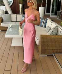 Spaghetti strap pink midi dress worn to brunch or rooftop party