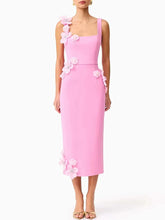 Square neck floral bodycon dress styled for cocktail parties