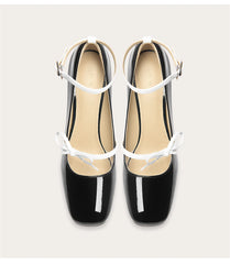 Square toe patent leather pumps with bow detail