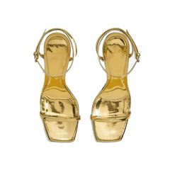 Statement architectural gold sandals for modern occasions