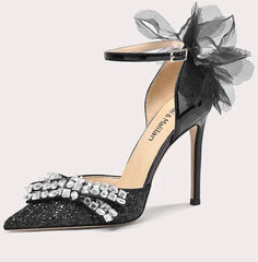 Statement black crystal party sandals for women with oversized bow