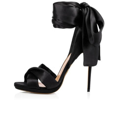 Statement bow black dress sandal perfect for luxury occasions