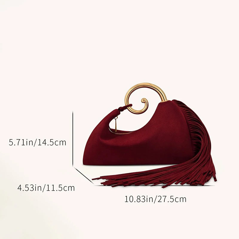 Statement mini bag with zipper closure and dramatic tassel fringe finish