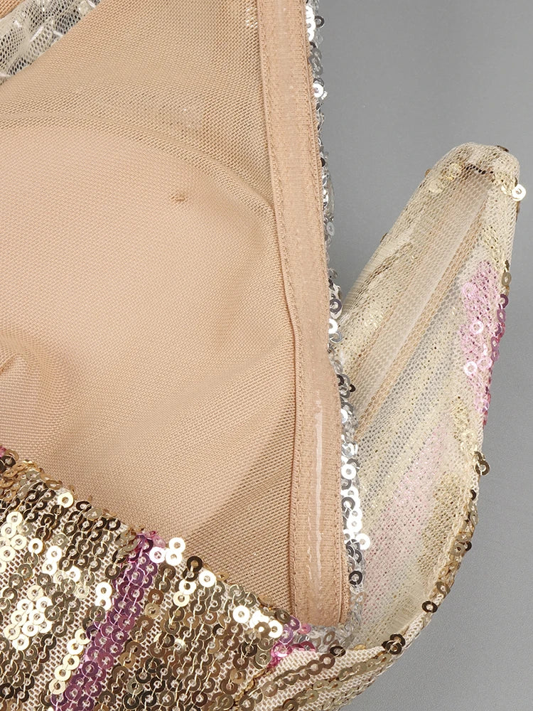 Statement gold embellished gala dress captured for red carpet celebrations