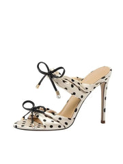 Statement party heels with bold bows designed for trendy event outfits