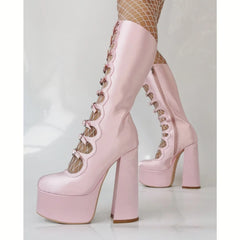 Knee-high boots with square heel and cut-out pattern