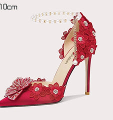 Statement red heels with pearls and gold ankle straps for festive events