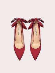 Statement red stiletto party pumps with oversized bow and pearls