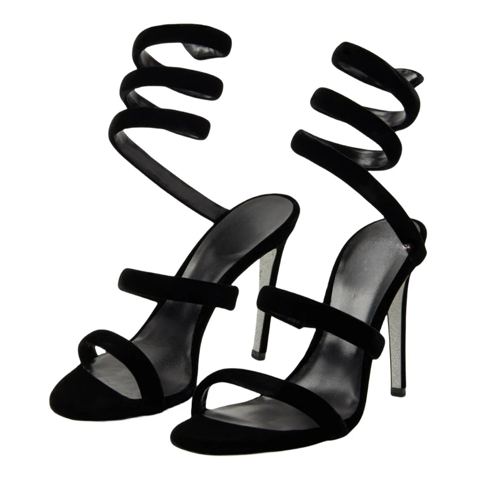 Statement spiral ankle wrap sandals in black with stiletto heel