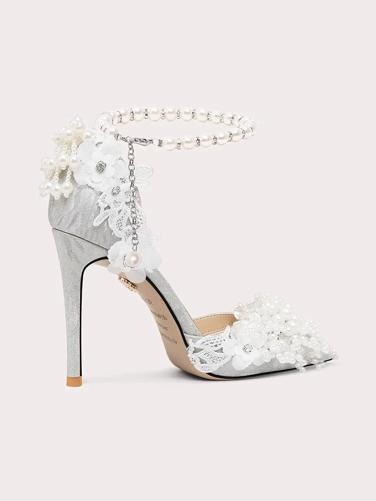 Statement white floral wedding heels with pearls for modern brides
