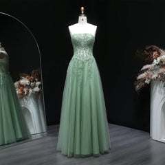 Strapless tulle A-line gown with appliqué bodice and floor-length skirt