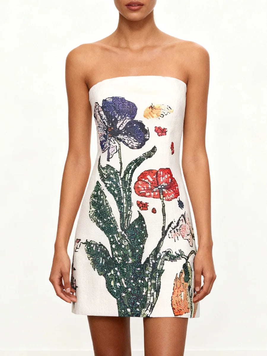 Front view of a slim strapless summer dress with artistic floral detailing